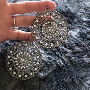 Round detailed silver dangle earrings